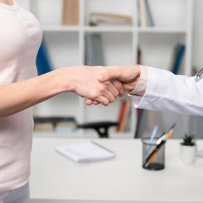 Chiropractic Bancroft IA Doctor Shaking Patients Hand